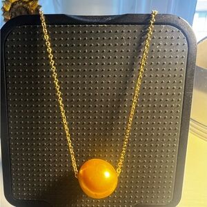 Golden Edison Fresh Water pearl necklace with adjustable hypo allergenic chain.